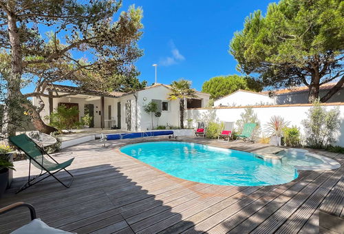 Maison à côté de la plage et des dunes, avec piscine.