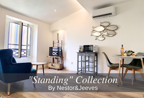 Un bel appartement climatisé avec une chambre.