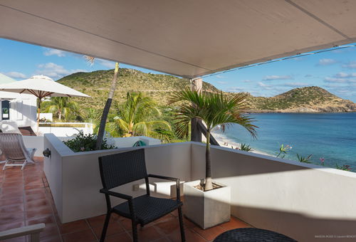 Charming villa inspired by the traditional wind houses of the island. Pool...