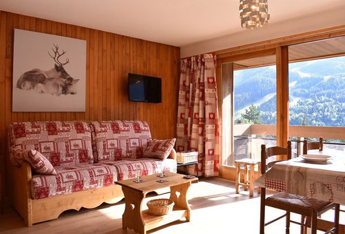 Appartement offrant une jolie vue sur les montagnes, proche des commerces -...