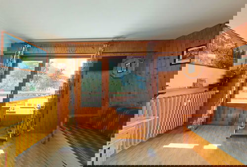 Studio avec balcon plein sud et casier à ski à 20mn à pied du village