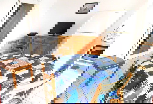 Ground floor apartment with a small garden located in a holiday residence 50...