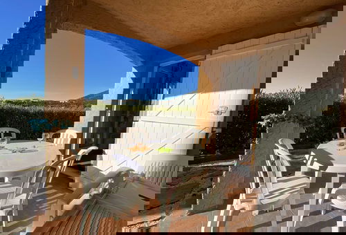 Beautiful sea view for this apartment with a garden and a shared pool on the...