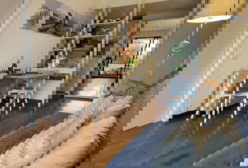 View of the marina from the terrace of this apartment with a shared pool