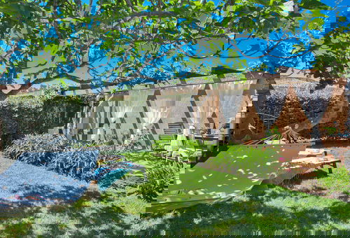 maison kiwi avec piscine chauffée  terrasse  jardin et bbq à Calvi 