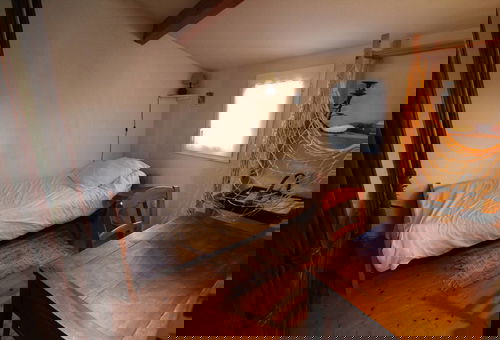 Small house with a sunny terrace, garage and parking