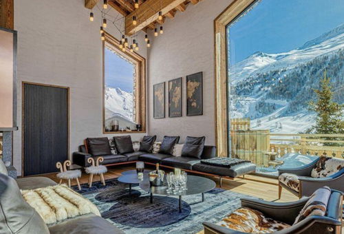 A unique chalet with a cathedral ceiling and immense windows and exceptional...