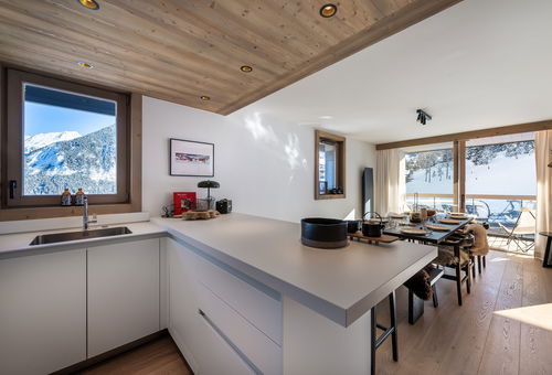 Close to the ski lifts and shops.
