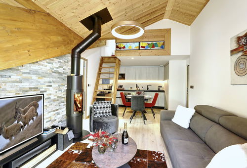 Intimate penthouse with a mezzanine