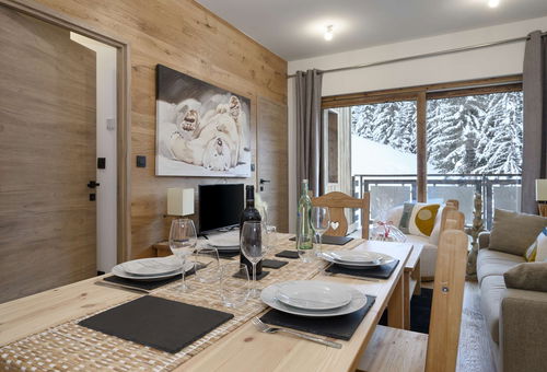 Brand new apartement with a beautiful view on the snowy pine trees and...