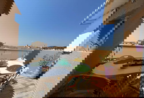 With the centre and the beach nearby.