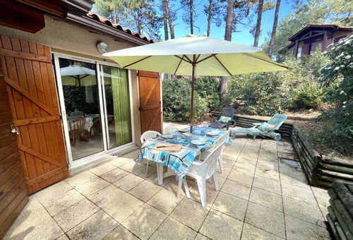 Close to the golf course in the pine forest.