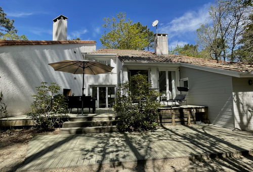 With swimming pool and tennis courts.
