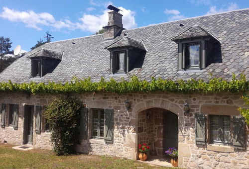 Salon / salle à manger de 40 m² (cheminée avec insert), cuisine entièrement...