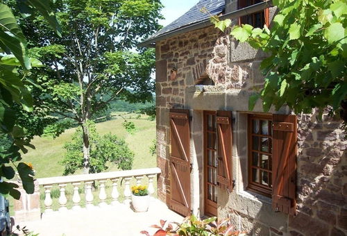 Living room with kitchenette and sitting area, wood stove, 1 bedroom (1...