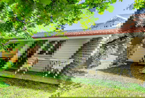 In a quiet, residential area of Ville de Printemps, this...