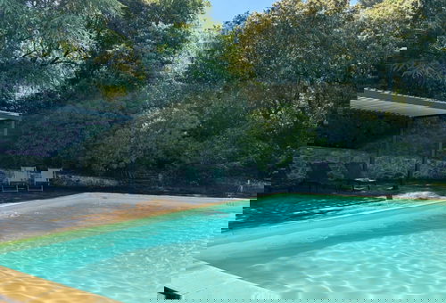 Family villa with swimming pool and shaded terrace