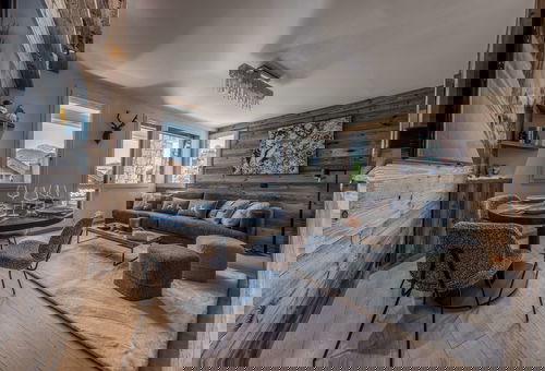 Lovely decorated apartment with its wooden walls in a chalet style located in...