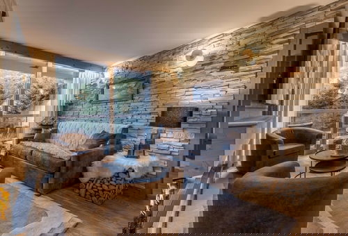 Très bel appartement avec ses murs en pierre et en bois pour une ambiance...