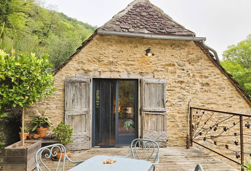 Stone cottage with slate roof, including a large terrace...