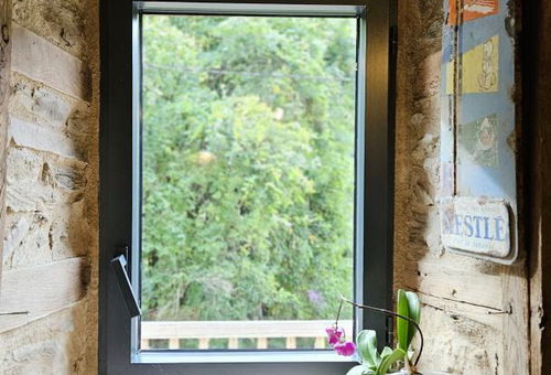 Stone cottage with slate roof, including a large terrace...