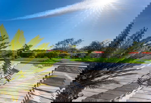 Ideal for stays with family or friends, it offers a bright living room with a...